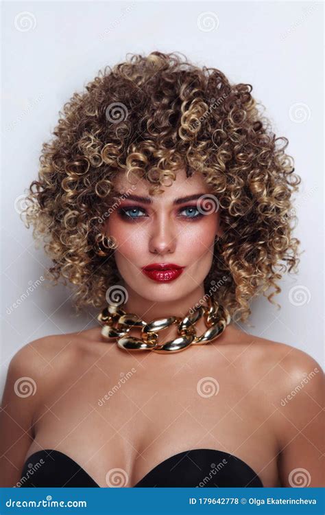 Beautiful Tanned Woman With Curly Afro Hair And Fancy Disco Makeup