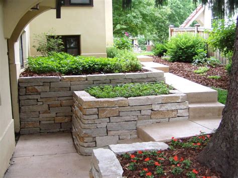 Dry Stack Limestone Retaining Walls To Create Levels In A Garden Back