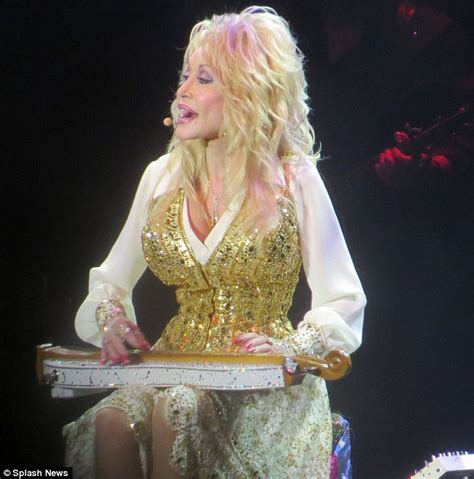 Dolly Parton 68 Accentuates Her Tiny Waist In A Glittering Gold Vest