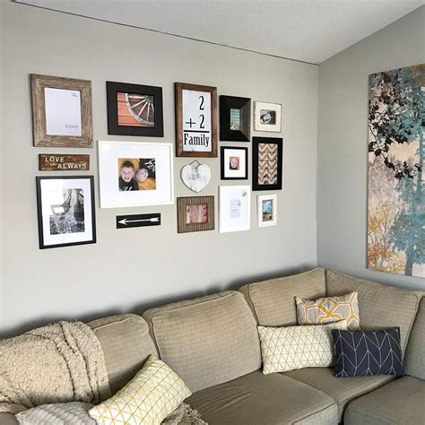 Mixed frames gallery wall above couch | Gallery wall, Gallery wall frames, Living room decor