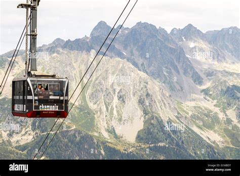 People In Cable Car Lift From Chamonix To Aiguille Du Midi On The Top