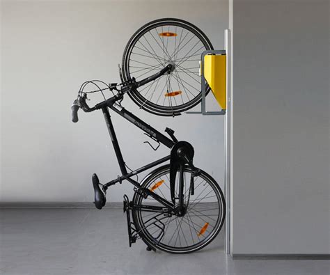 Whether you live in a tiny apartment or a home with a garage that is filled to the brim, having more space can be nice. Vertical Bike Storage Lifts : bike lift
