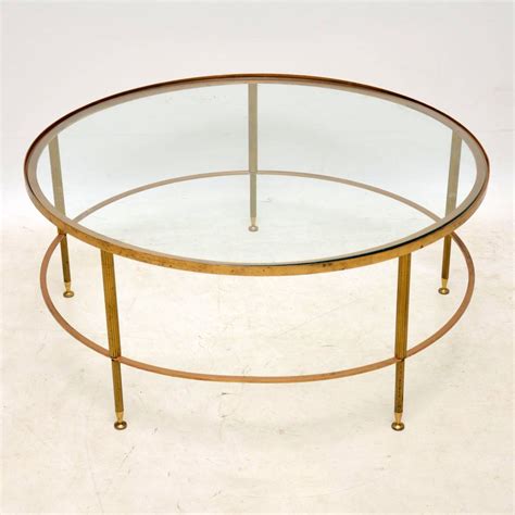 In a rustic setting, an antique brass coffee table will create contrast with a shot of glamour. 1960's French Brass & Glass Coffee Table | Interior ...