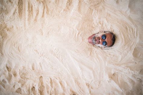 Buried In The Sand Stock Photos Pictures And Royalty Free Images Istock