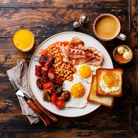 English Breakfast With Fried Eggs Sausages Bacon Beans Toasts And
