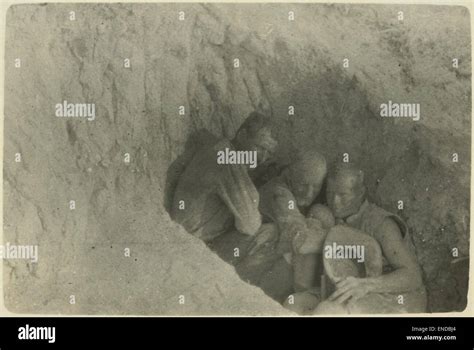 Sheltering From Bursting Shells Showing Three Anzac Soldiers Huddled