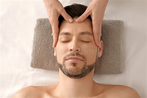 Handsome Man Having Head Massage In Spa Salon Stock Image Image Of