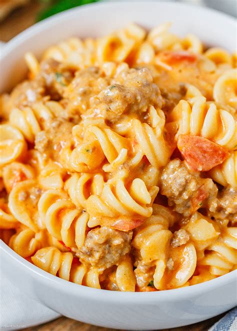 Add the salt, pepper, tomatoes, pasta, half and half and chicken broth. Cheesy Sausage Rotini Pasta Recipe - Sausage Recipe with ...
