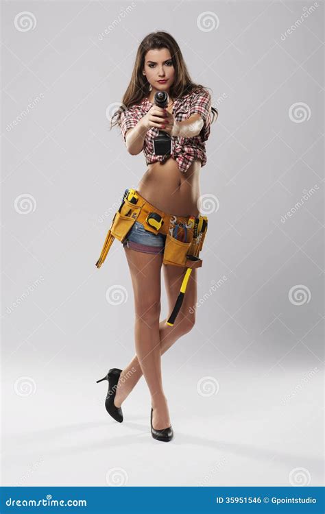 Woman Holding Drill Stock Photo Image Of Serious Beautiful