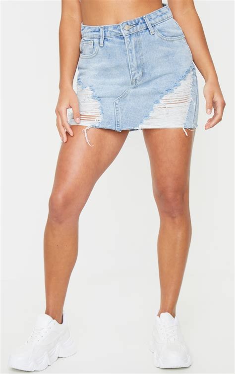 Petite Blue Wash Ripped Mini Denim Skirt Prettylittlething Usa