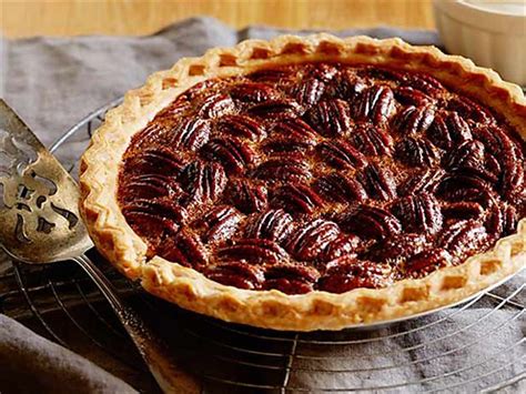 Lower the oven temperature to 350 °f and continue to bake for an additional 25 minutes or until pie is set. paula deen pecan pie bars