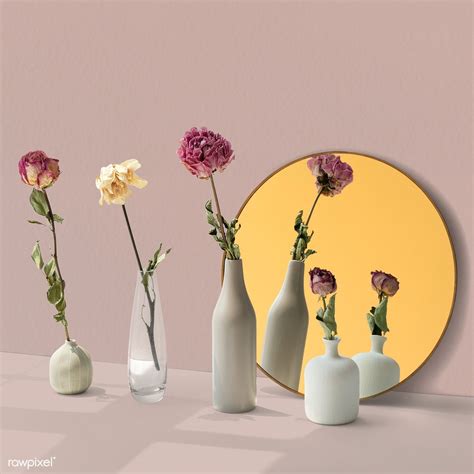 Dried Flowers In Minimal Vases By A Round Mirror Premium Image By