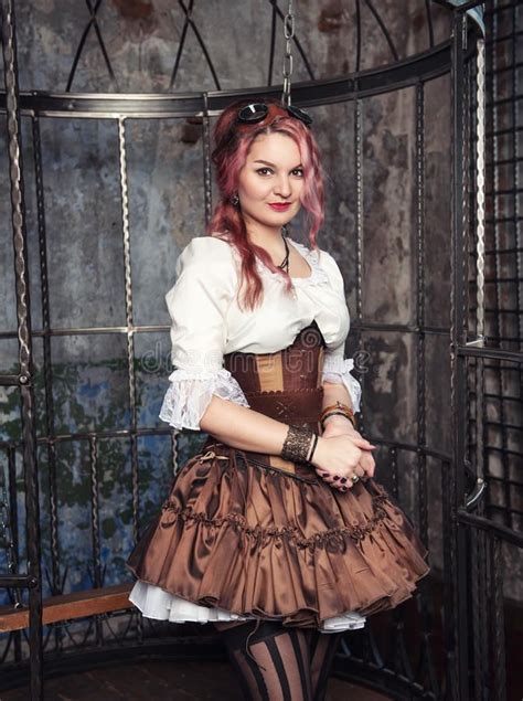 Beautiful Steampunk Woman In The Cage Stock Images