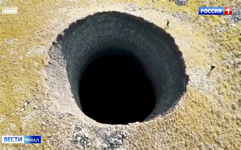 These Gigantic Siberian Sinkholes Have Scientists Concerned Esquire Middle East The Regions