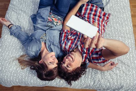 Couple In Love Taking Selfie With Smartphone On Stock Image Image Of Internet Real 63655265