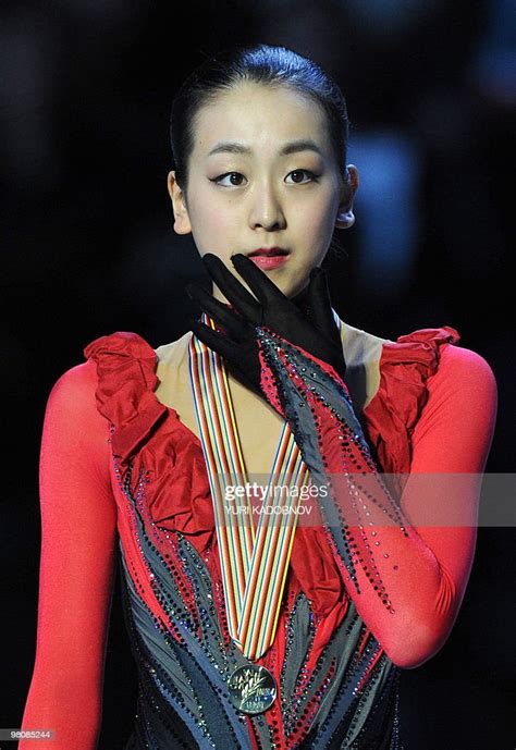 Gold Medalist Japans Mao Asada Poses On The Podium Of The Ladies