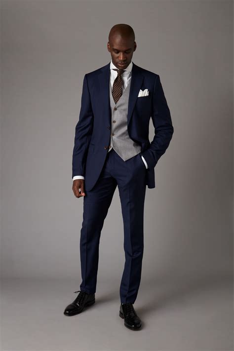 You wouldn't wear a loud paisley tie to a funeral, for example. THE DROP | Bespoke suits made for you. Mixed fabric navy ...