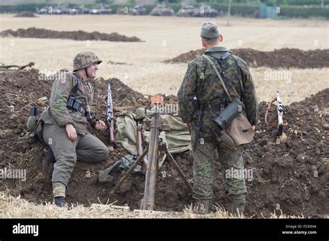 World War 11 Soldiers In The Trenches On The Battlefield Stock Photo