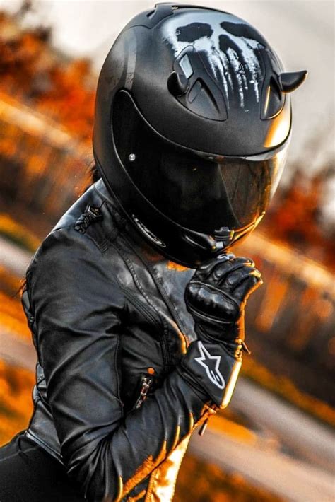 Hot Biker Girl Wearing A Cool Punisher Motorcycle Helmet With Horns
