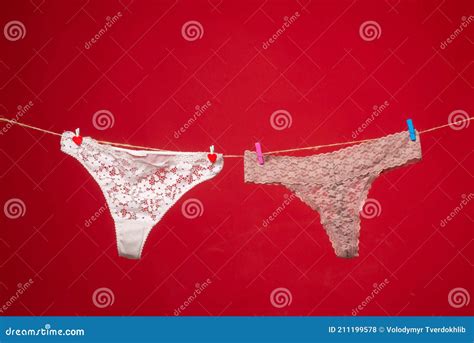 Panties Isolated Over Red Womans Lace Panties Erotic Panties Hanging On Rope Female Lingerie