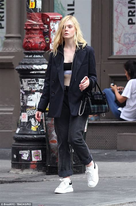 Elle Fanning Flaunts Toned Tummy In Sports Bra In Nyc Daily Mail Online