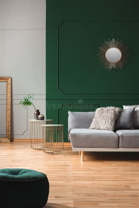 Emerald Green Living Room Interior With Grey And Golden Accents Stock
