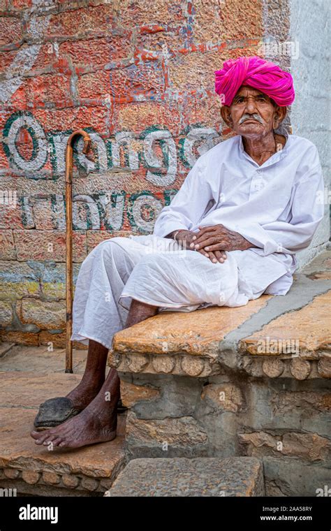 Elderly Indian Man Resting On Some Steps Jaisalmer Rajasthan India