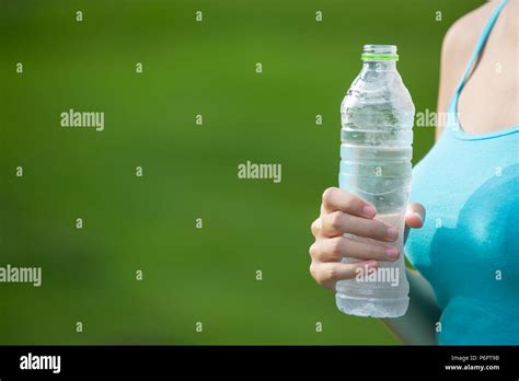 Girl Drinking Water Exercise Stock Photo Alamy