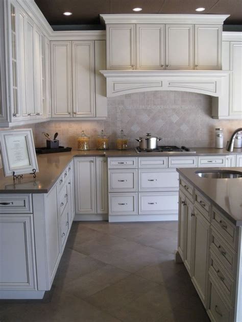 Give Your Plain White Kitchen Cabinets An Aged Appearance With An