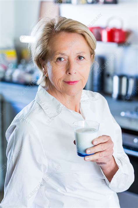 Woman Drinking Milk Stock Image C035 0643 Science Photo Library