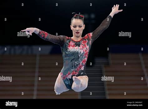 Shallon Olsen Of Canada Performs On The Balance Beam During The Women