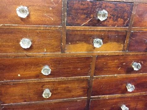 The drawers have a locking mechanism accessed in the glass front cabinet which can be key locked. Victorian Apothecary Chest Of 14 Drawers - Antiques Atlas