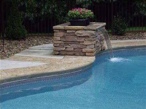 It has been noticed that new plans and protocols are more useful for the development of decoration pieces at home. Retaining Wall Waterfalls | Formal Falls by Pondbuilder | Pool waterfall, Pool water features ...