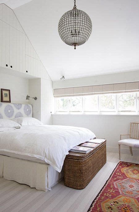 Vaulted ceilings have evolved throughout history to include a diverse range of shapes. Lovely bedroom boasts a vaulted ceiling accented with a ...