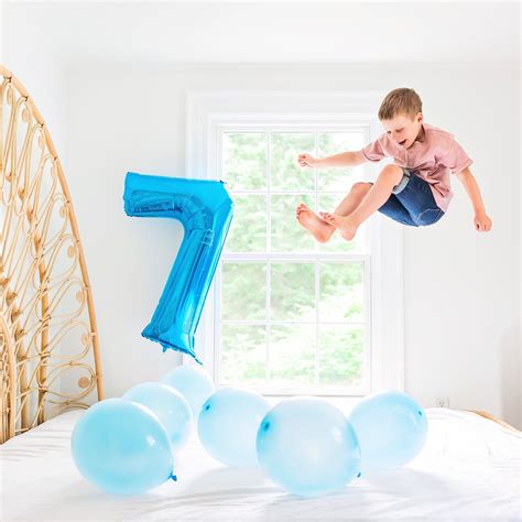 Creative Birthday Photo Shoot With Balloons 7 Years Old Boy Jumping On