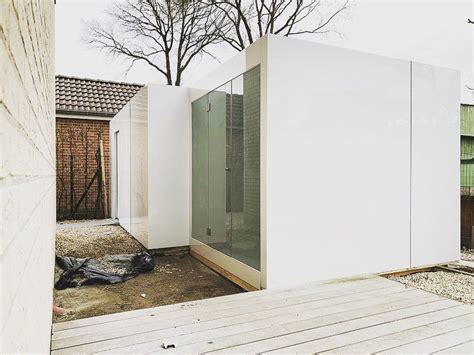 White Glossy Outdoor Sauna Project With Built In Shower And Storage