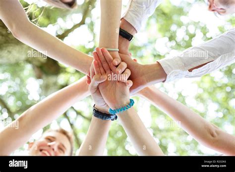 Teenagers Joined Their Hands In A Circle Stock Photo Alamy