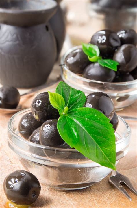195 Black Olives Glass Bowl Wooden Spoon Stock Photos Free And Royalty