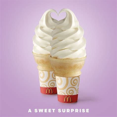 Two Ice Cream Cones With Hearts Shaped On Top And The Words A Sweet Surprise