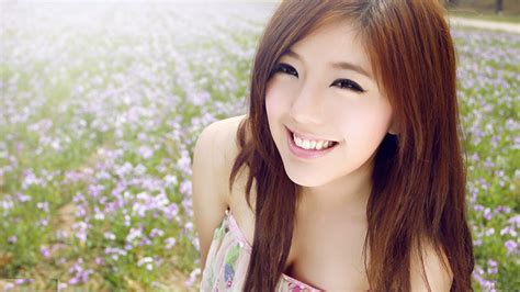 Beautiful Asian In A Flower Field Hungeuropean