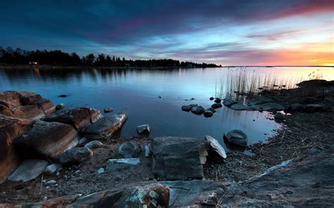 Landscape Photograph Of Rocks At Lakeside During Golden Hour Hd