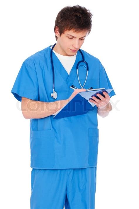 Serious Nurse Boy With Notepad Stock Photo Colourbox