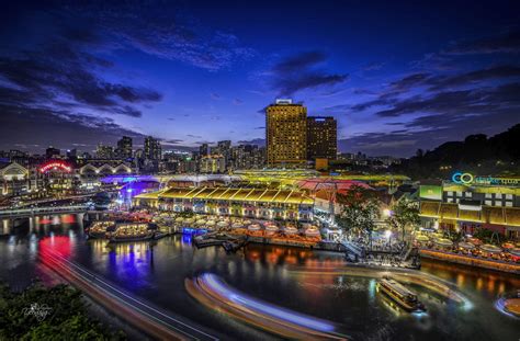 Clarke quay central is a shopping center in singapore and has about 100 residents. Sunset at Clark Quay, Singapore, Singapore