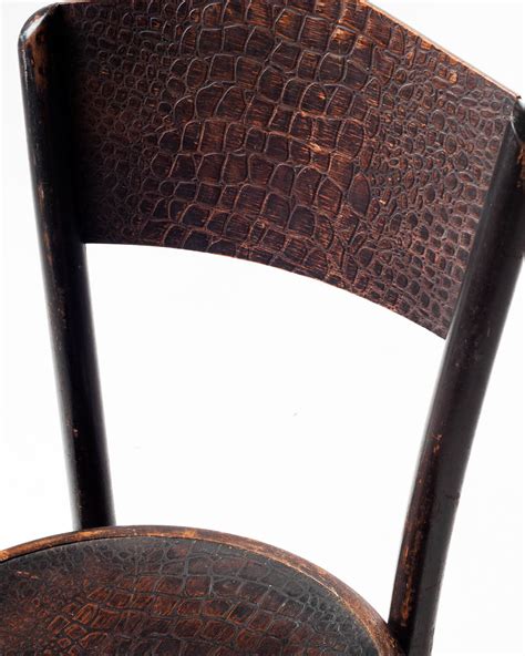 Ch031 Wood Embossed Snakeskin Chair Prop Rental Acme Brooklyn