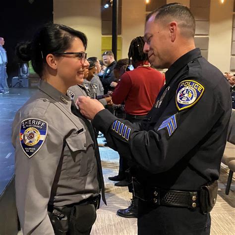 El Paso County deputy gets badge pinned on by officer who saved her