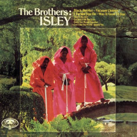 the brothers isley album cover with three women in pink dresses standing on a bridge
