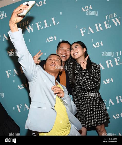 Actress Awkwafina Right Takes A Selfie With Designers Phillip Lim And