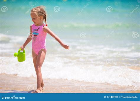 Adorable Little Girl At Beach During Summer Vacation Stock Image