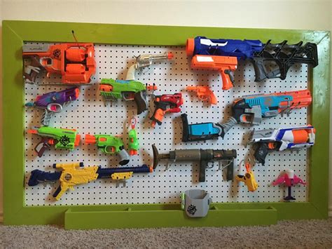 .squirt guns, nerf guns, rubber band guns, fake laser guns that made noise, whatever kind of gun best heavily modified nerf guns (and other toy gun mods) that we have found across the interwebs! Nerf gun storage rack. Pegboard 36x48 or by ...