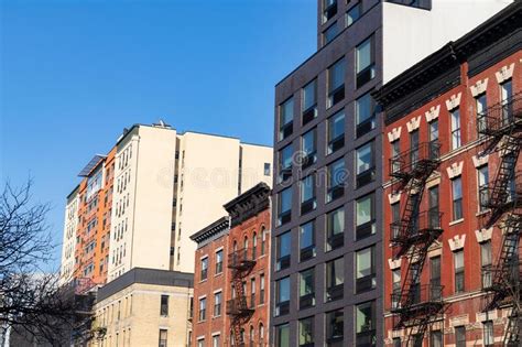 Row Of Colorful Apartment Buildings In Harlem Of New York City Stock